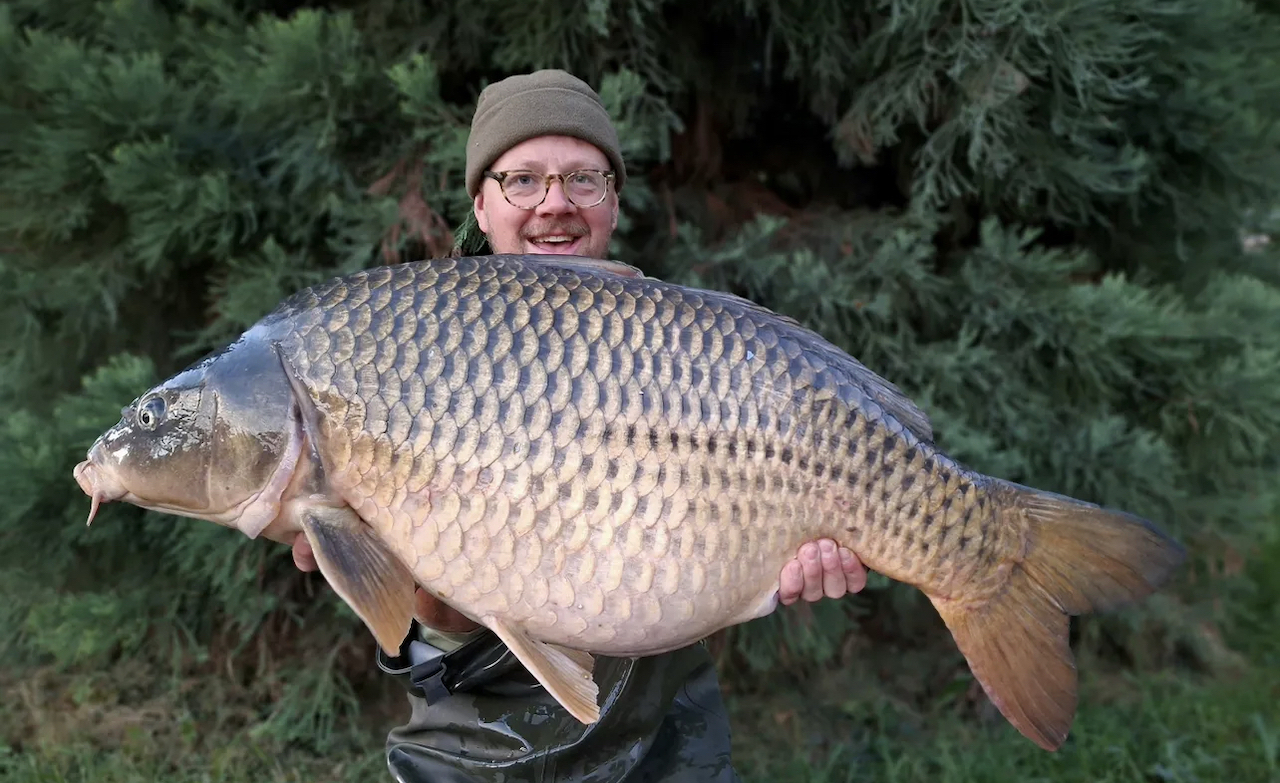 Man holding carp